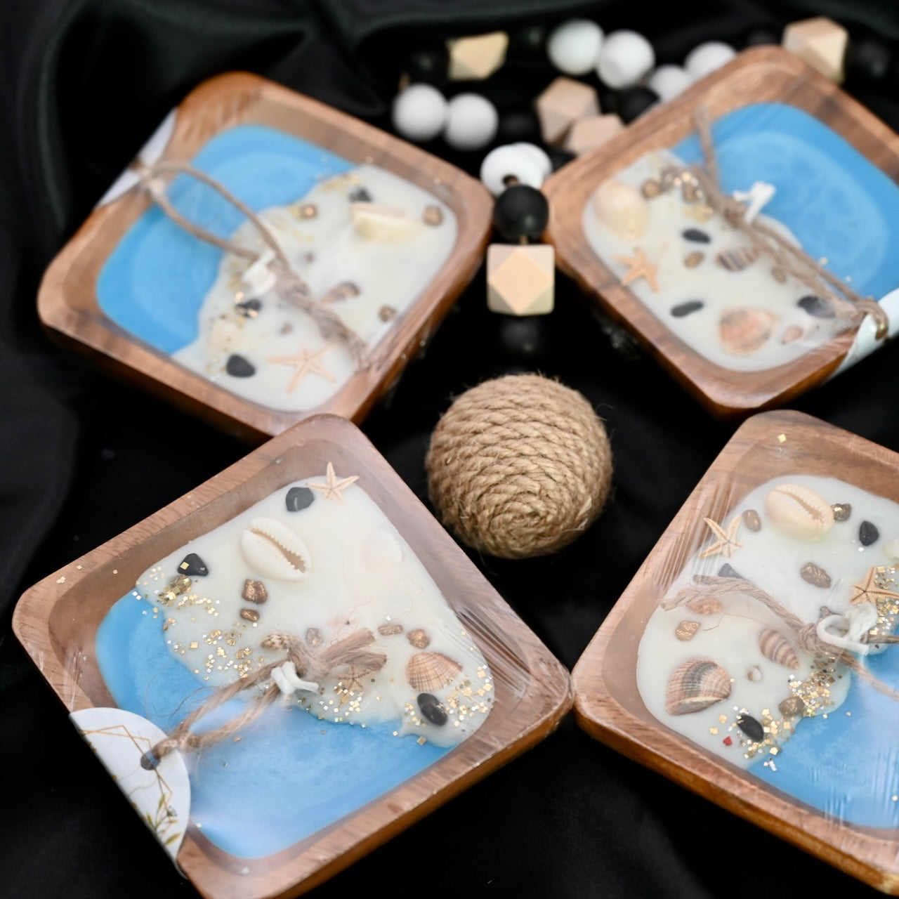 Handcrafted 100% Soy Wax Decorative Candle with seashells and starfish in a wooden acacia wood bowl.