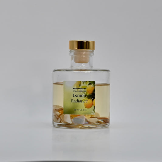 Glass bottle with a gold cap labeled 'Lemon Radiance' on a white background