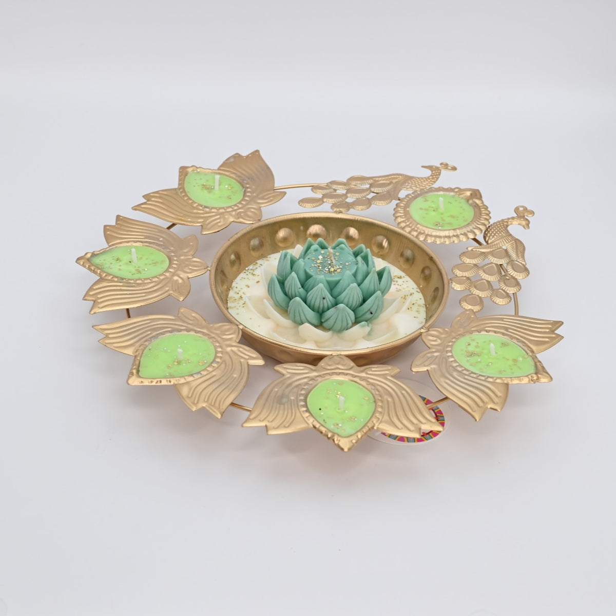 Right view of the Green Lotus Peacock Metal Urli Candle Arrangement with gold-toned peacocks and decorative candle holders.