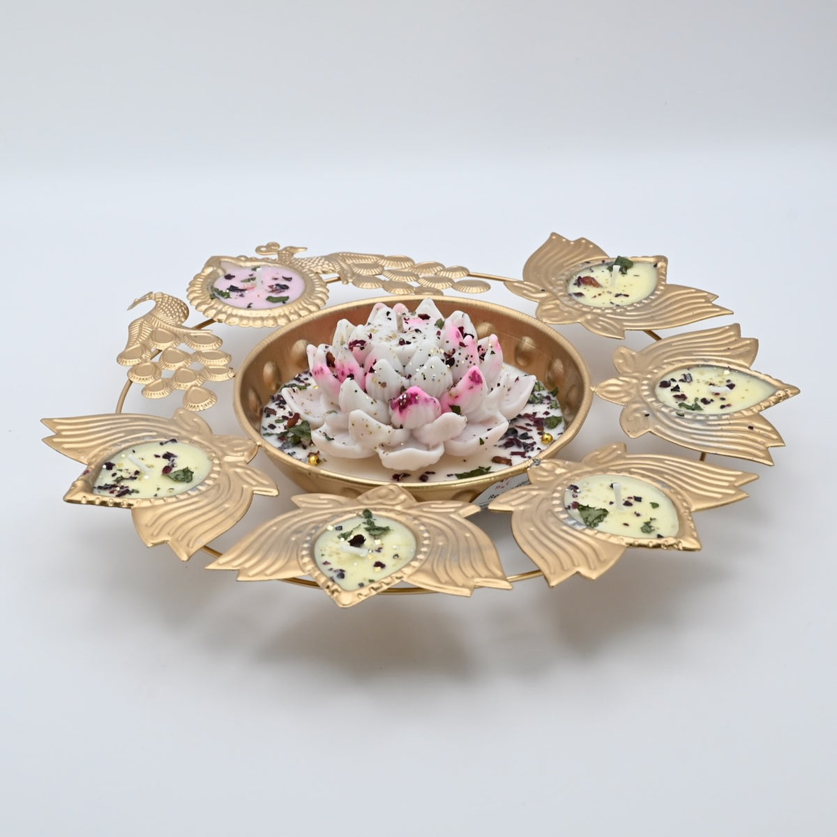 Right view of the White Lotus Peacock Metal Urli Candle Arrangement with gold-toned peacocks and decorative candle holders.