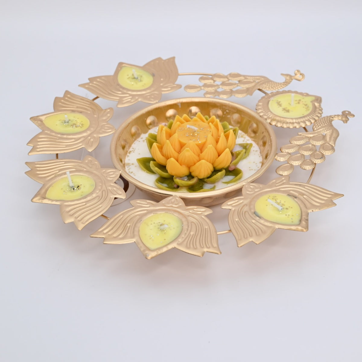 Right view of the Yellow Lotus Peacock Metal Urli Candle Arrangement with gold-toned peacocks and decorative candle holders.
