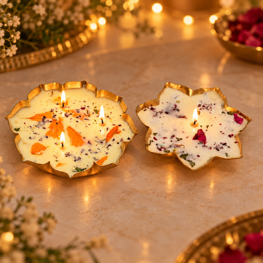 Lit Lotus Duo Diya Candle Set with four visible flames in a warm festive home lifestyle setting.