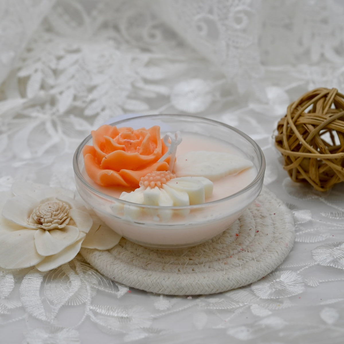 A1 lustre glass bowl candle decorated with colorful soy wax flowers.