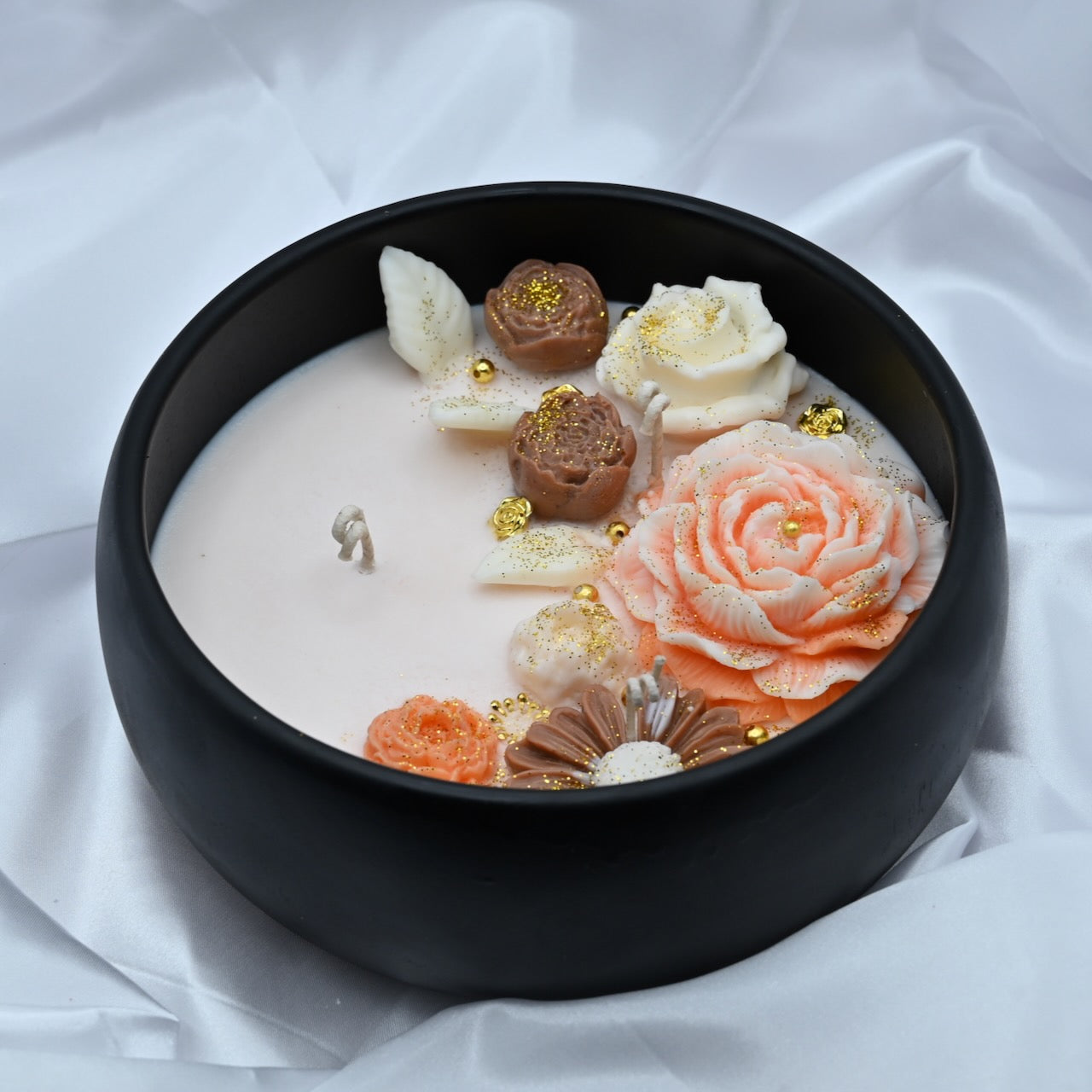 Right view of midnight blue acacia wood bowl candle with handcrafted floral wax design, medium 8 inch decorative soy candle