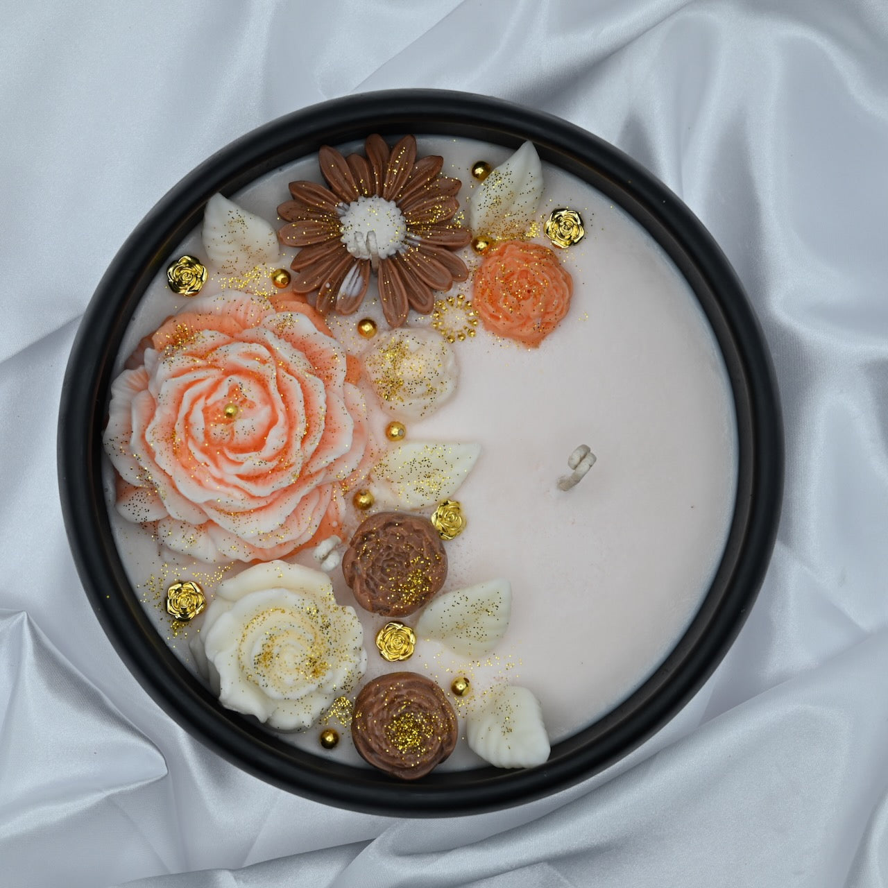 Top view of midnight blue acacia wood bowl candle with handcrafted floral wax design, medium 8 inch decorative soy candle