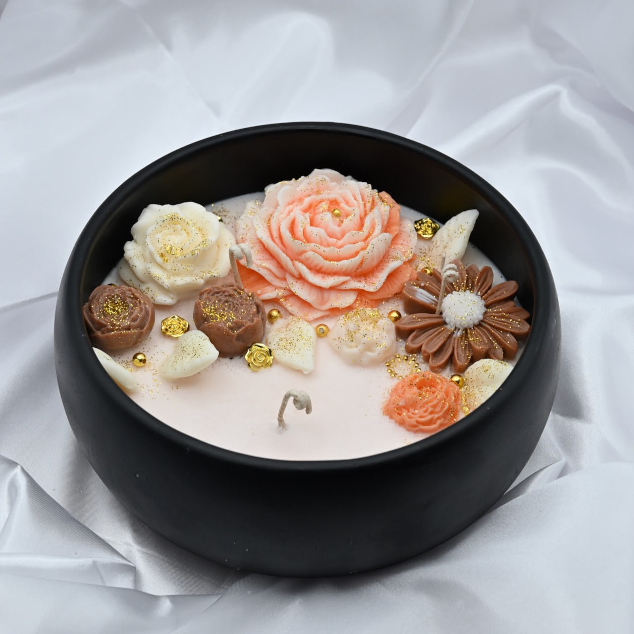 Up view of midnight blue acacia wood bowl candle with handcrafted floral wax design, medium 8 inch decorative soy candle